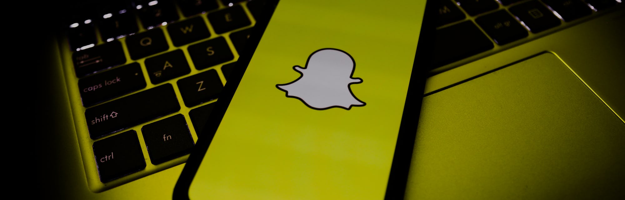 Snapchat logo is seen displayed on a phone screen in this illustration photo taken in Poland on Nove...