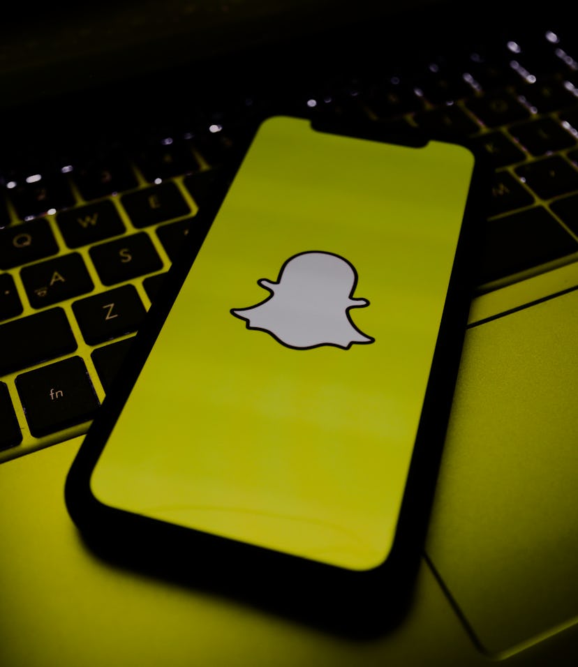 Snapchat logo is seen displayed on a phone screen in this illustration photo taken in Poland on Nove...