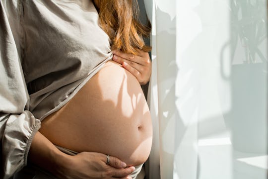 When Does Your Belly Pop With Twins Experts Explain When Does Your Belly Pop With Twins Experts Explain