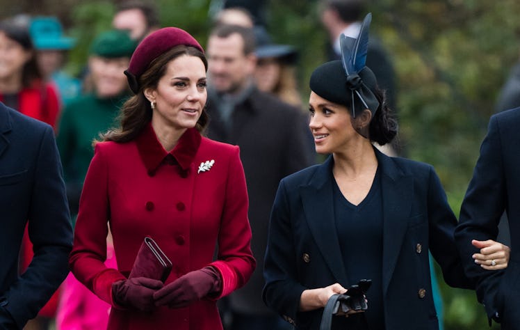 KING'S LYNN, ENGLAND - DECEMBER 25: Catherine, Duchess of Cambridge and Meghan, Duchess of Sussex at...