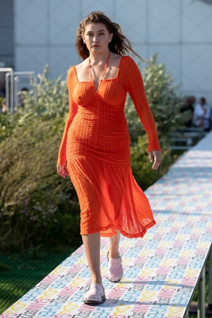 Ganni Spring 2022 offered a new way to dress for staying home, with whimsical prints, bright colors,...