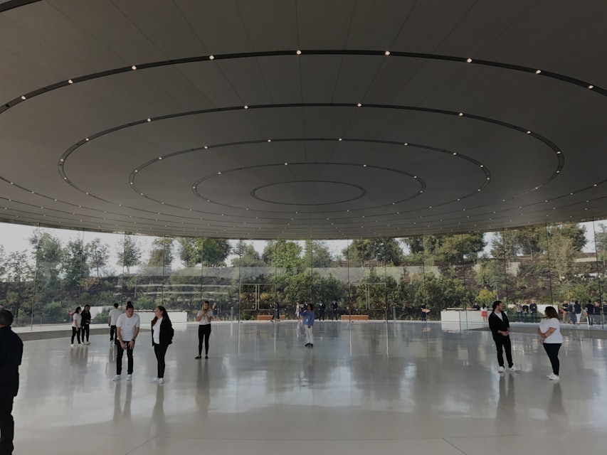 Tech journalists gather at the Steve Jobs Theater before the first-ever product launch at the new Ap...