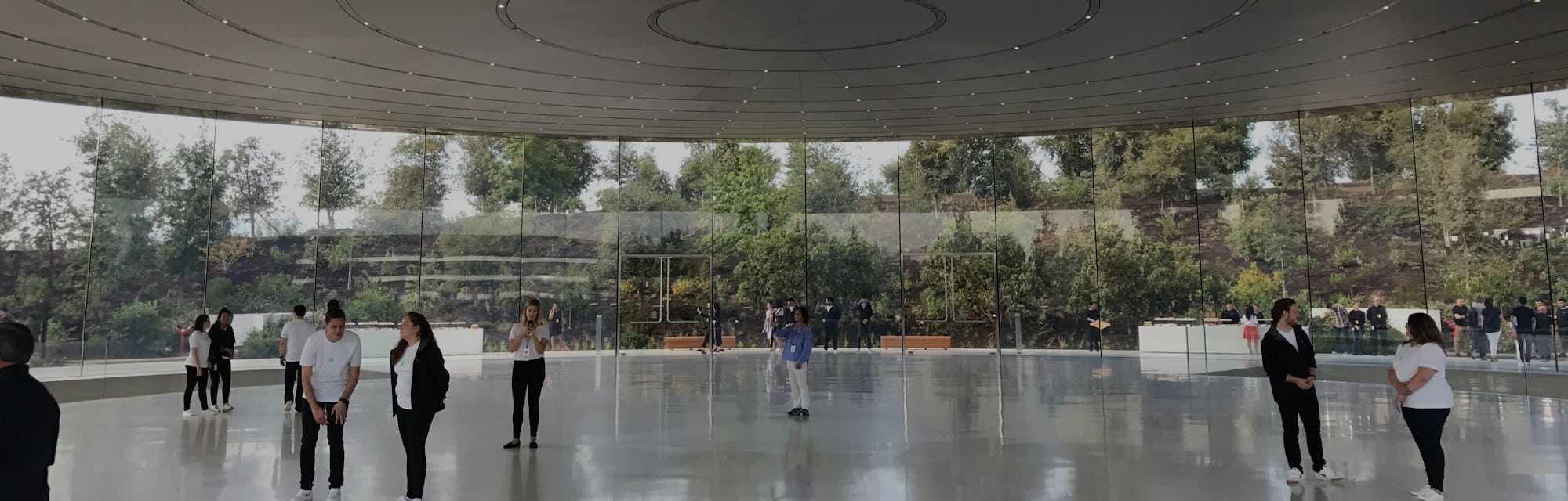 Tech journalists gather at the Steve Jobs Theater before the first-ever product launch at the new Ap...