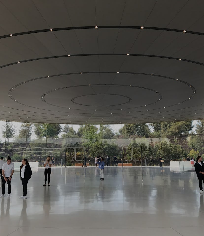 Tech journalists gather at the Steve Jobs Theater before the first-ever product launch at the new Ap...