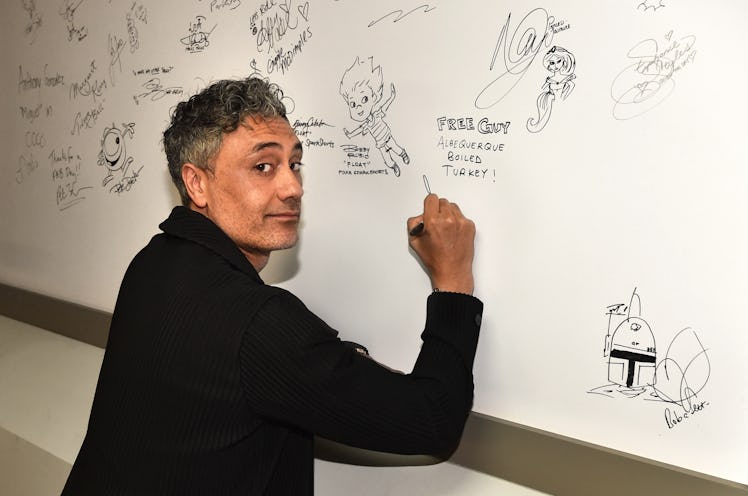 LOS ANGELES, CALIFORNIA - AUGUST 12: Taika Waititi signs an autograph at the "Free Guy" Opening Nigh...