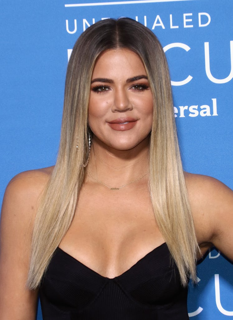 Khloé Kardashian is embracing her naturally curly hair, and it's so nice to see.