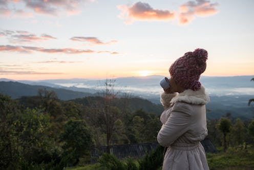 Woman wake up relax in morning on th mountain