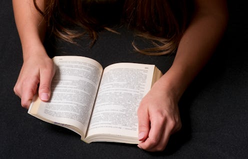 Young Woman Reading A Book