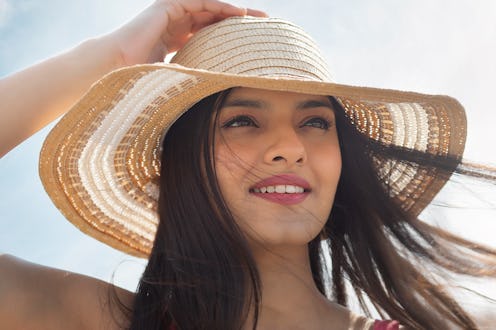 woman wearing a sun hat