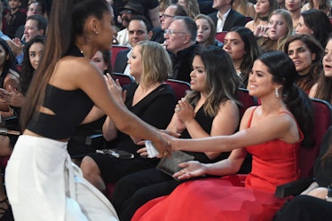 Ariana Grande and Selena Gomez support each other.