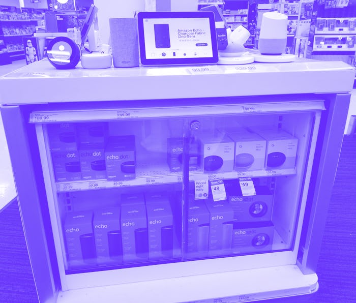 Close-up of display of multiple Amazon Echo and Amazon Alexa smart speaker devices from Amazon and G...