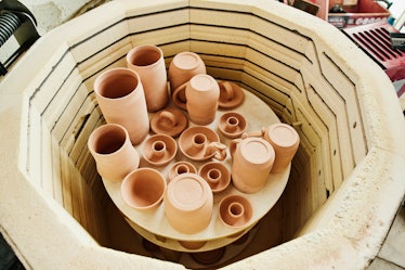 pottery sitting in a kiln