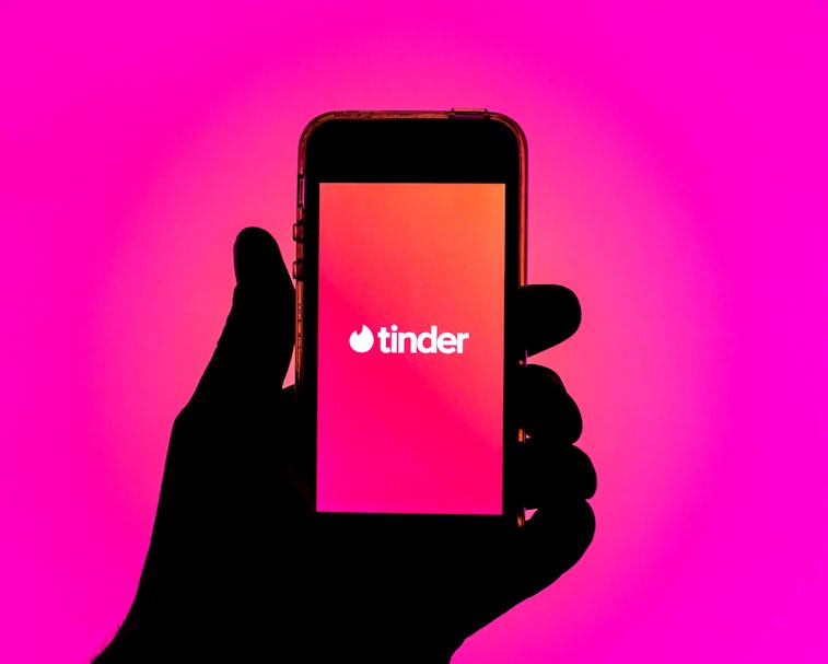 SPAIN - 2021/03/30: In this photo illustration, the Tinder app seen displayed on a smartphone screen...