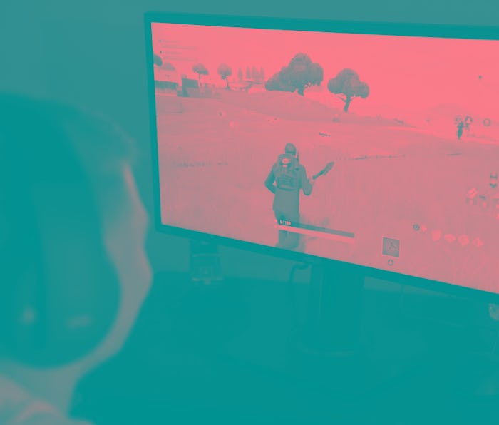 Aidan Fry plays Fortnite in his room after school Monday. Photo by Lauren A. Little 4/30/2018 (Pho...