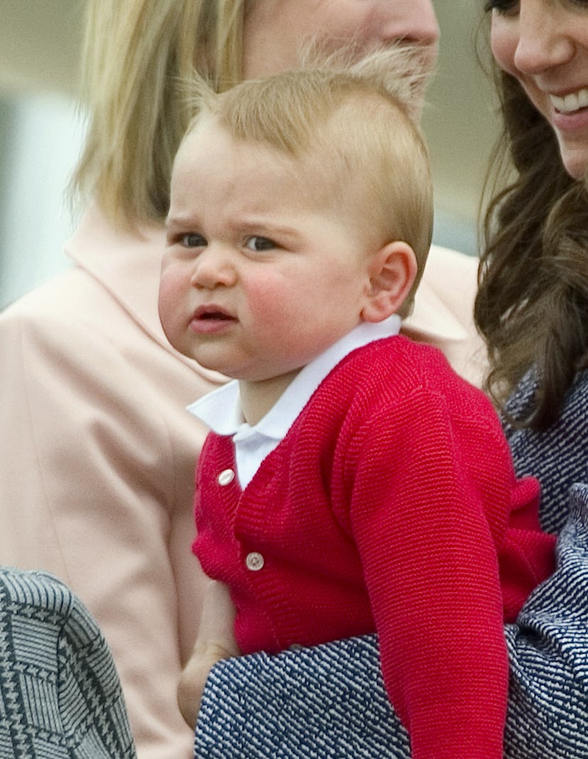 Prince George wears a red cardigan in Australia.