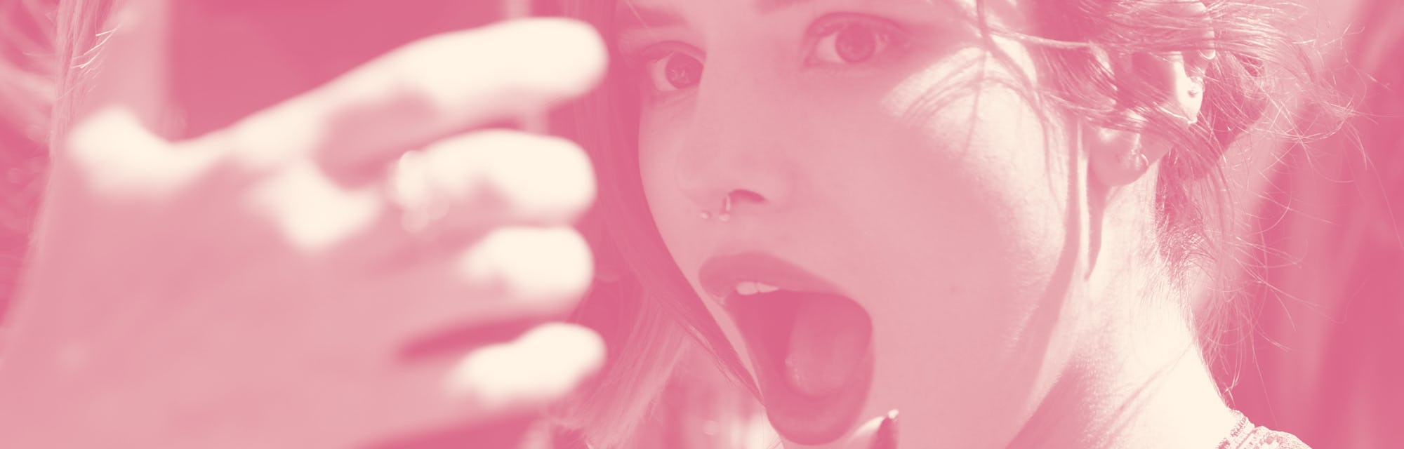 UNIVERSAL CITY, CA - MARCH 27: Bella Thorne takes selfies with fans at "Extra" at Universal Studios...