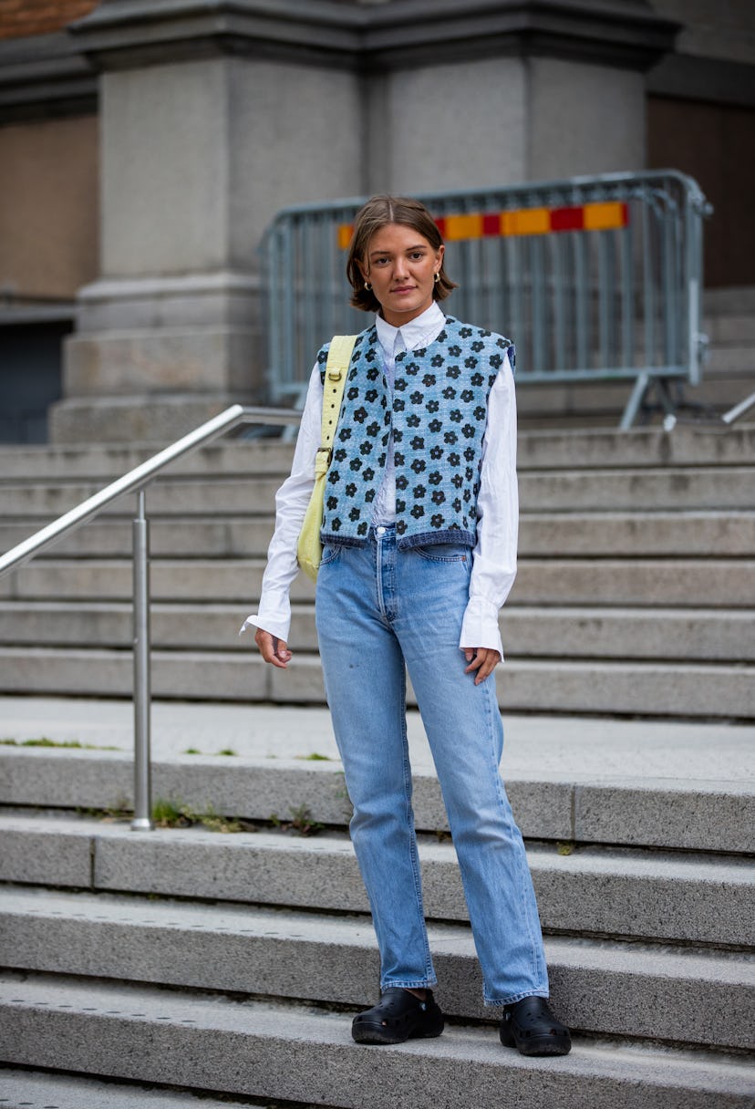 COPENHAGEN, DENMARK - AUGUST 10: A guest is seen wearing vest, denim jeans outside malaikaraiss on A...