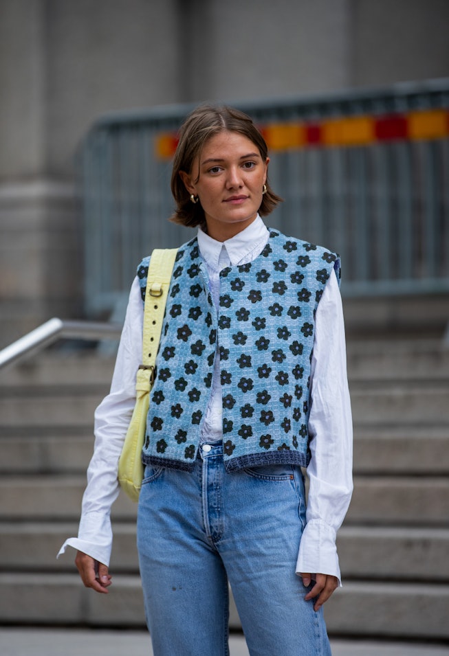 COPENHAGEN, DENMARK - AUGUST 10: A guest is seen wearing vest, denim jeans outside malaikaraiss on A...