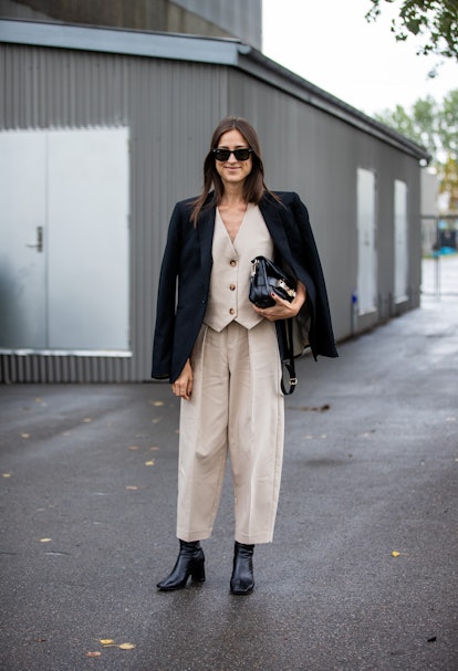 COPENHAGEN, DENMARK - AUGUST 10: A guest is seen wearing beige suit outside Gestuz on August 10, 202...