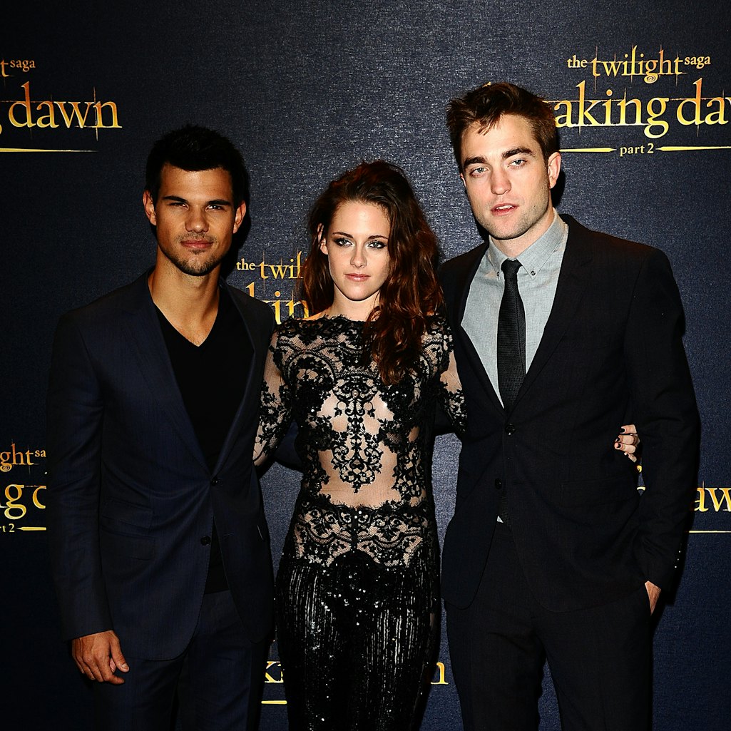 (left to right) Taylor Lautner, Kristen Stewart and Robert Pattinson arriving for the premiere of Th...