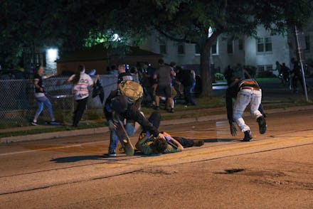KENOSHA, WISCONSIN, USA - AUGUST 25: (EDITORS NOTE: Image contains graphic content.) Clashes between...