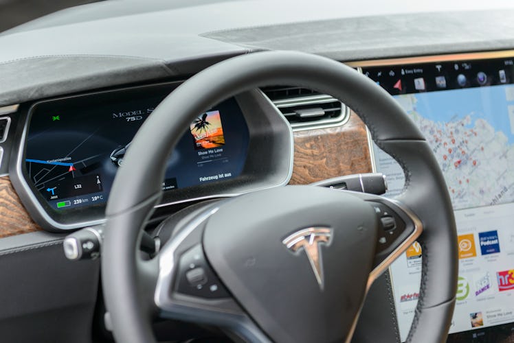 Tesla Model S 75D all-electric, luxury, saloon car dashboard with digital information displays and l...