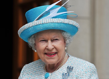 Britain's Queen Elizabeth II arrives to meet Irish Prime Minister Enda Kenny at the Government Build...
