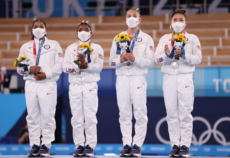 Simone Biles of the United States on the medal podium after experiencing "the twisties," causing her...