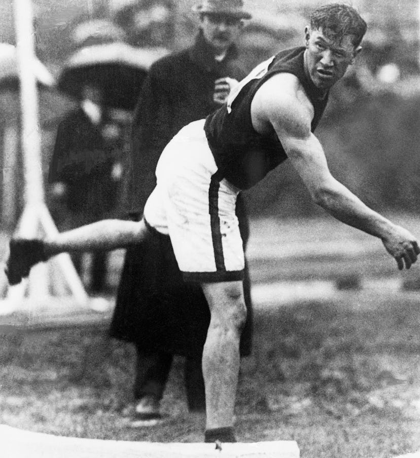 (Original Caption) 1912-Stockholm, Sweden: Jim Thorpe throws the shot put during the 1912 Olympic Ga...