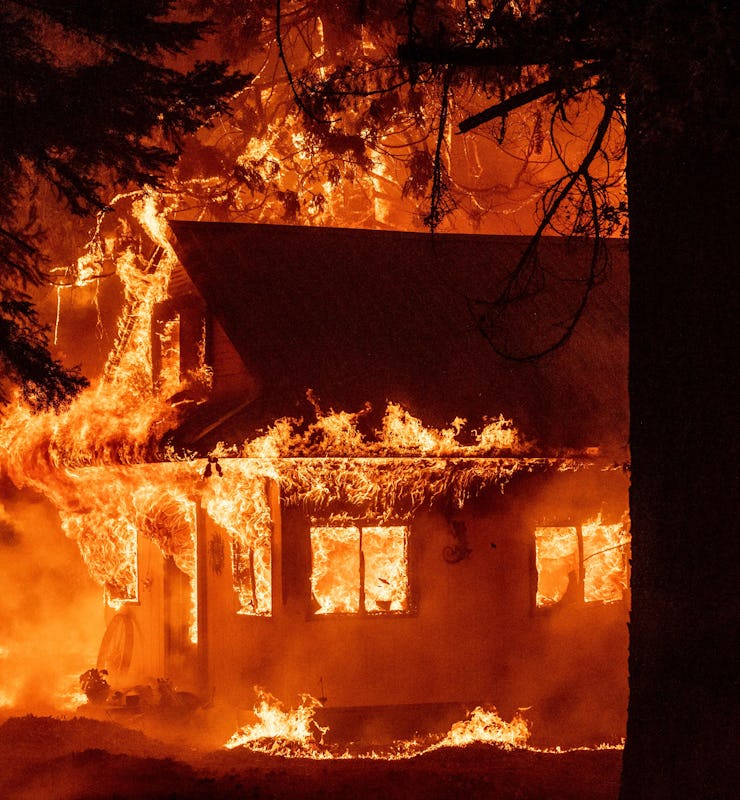 A home burns during the Dixie fire on July 24, 2021, in the Indian Falls neighborhood of unincorpora...