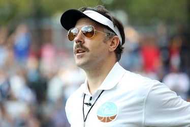 Jason Sudeikis, in character as coach Ted Lasso, whose zodiac sign is Sagittarius.