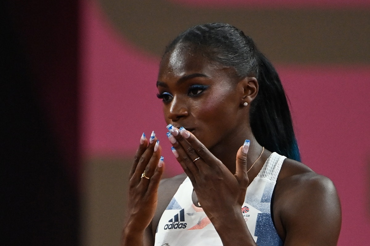 Britain's Dina Asher-Smith gets ready to compete in the women's 100m semi-final during the Tokyo 202...