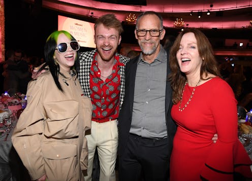 LOS ANGELES, CALIFORNIA - DECEMBER 12: (L-R) Billie Eilish, Finneas O'Connell, Patrick O'Connell and...