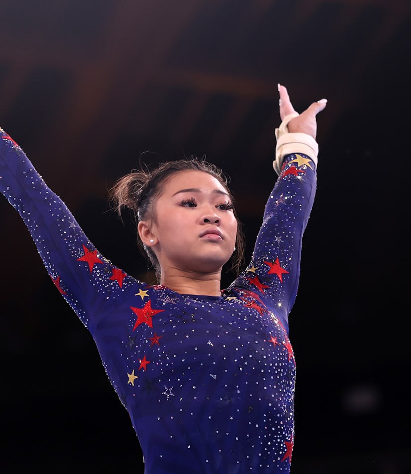 TOKYO, JAPAN - JULY 25: Sunisa Lee of Team United States reacts after competing on uneven bars durin...