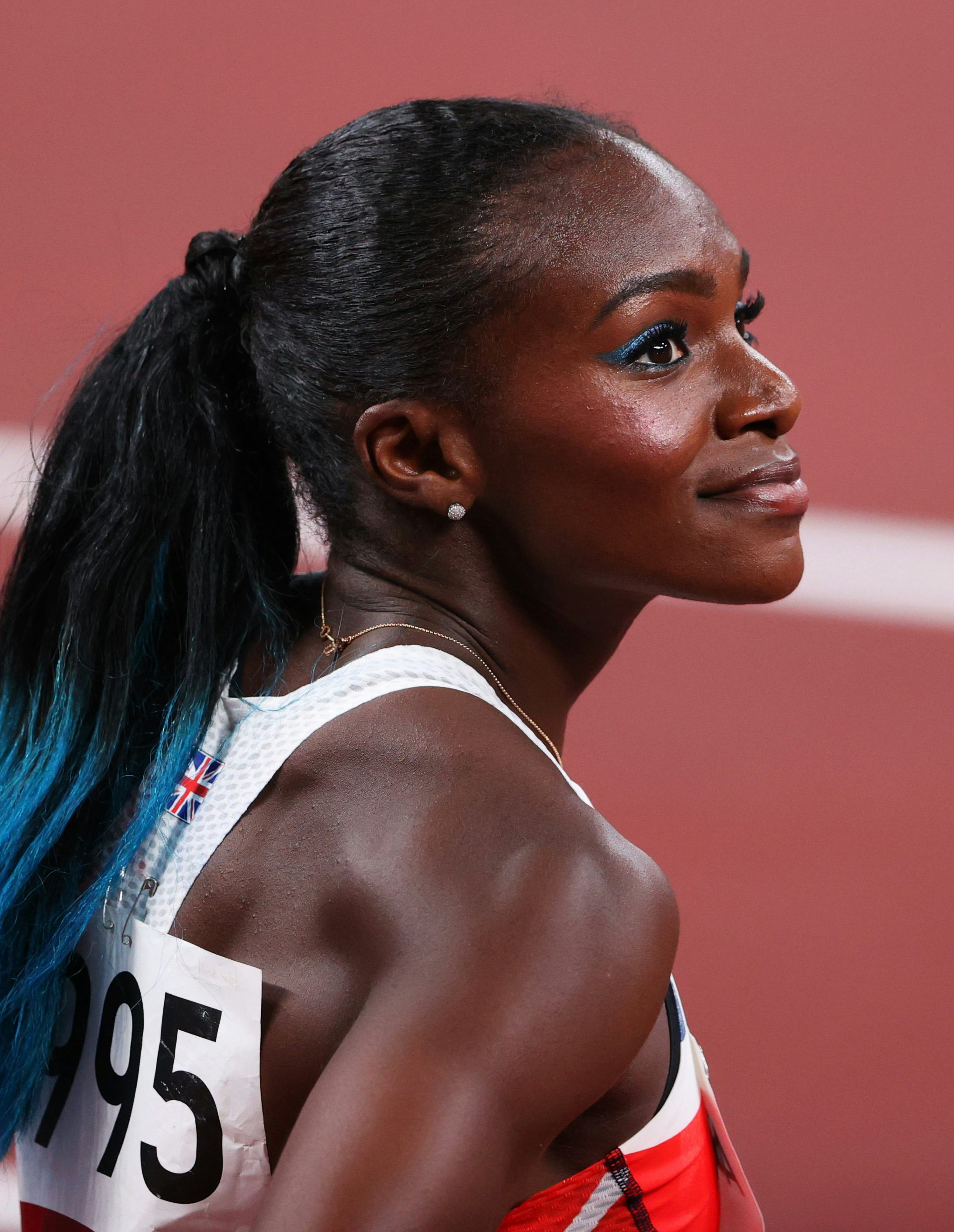 TOKYO, JAPAN - JULY 31: Dina Asher-Smith of Team Great Britain reacts after competing in the Women's...