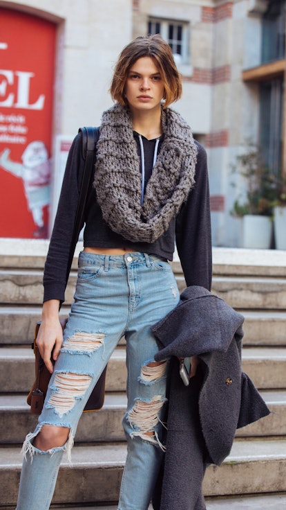 Model wearing an infinity scarf.