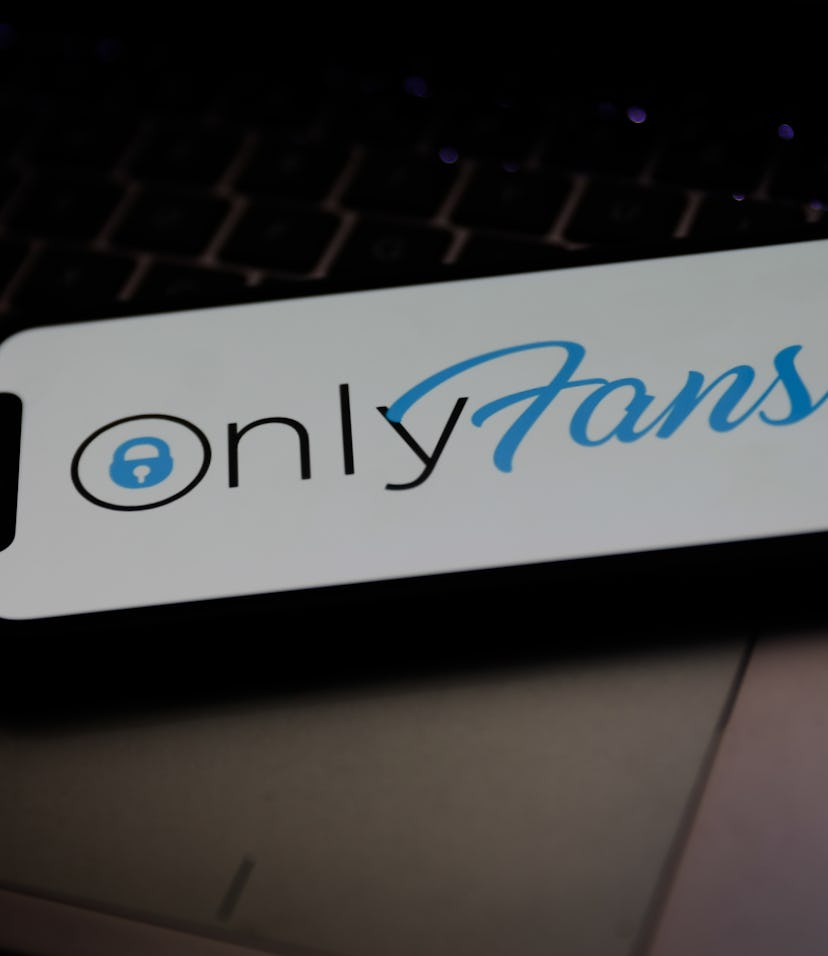 OnlyFans logo is seen displayed on a phone screen in this illustration photo taken in Krakow, Poland...