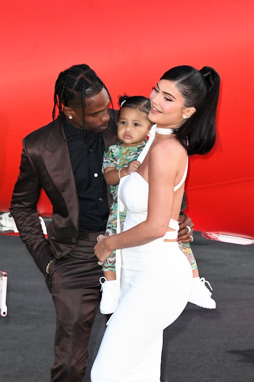 SANTA MONICA, CALIFORNIA - AUGUST 27: (L-R) Travis Scott, Stormi Webster, and Kylie Jenner attend th...