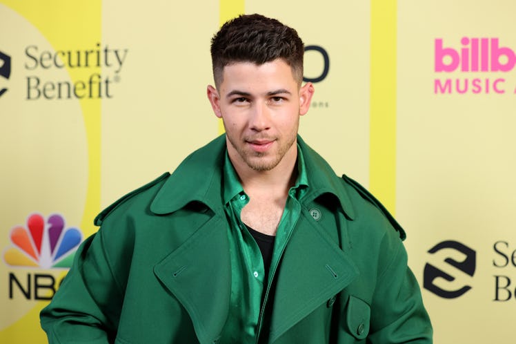 LOS ANGELES, CALIFORNIA - MAY 23: Nick Jonas poses backstage for the 2021 Billboard Music Awards, br...