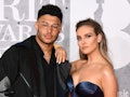 LONDON, ENGLAND - FEBRUARY 20: (EDITORIAL USE ONLY) Alex Oxlade-Chamberlain and Perrie Edwards atten...
