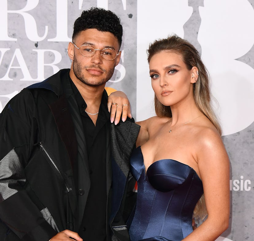 LONDON, ENGLAND - FEBRUARY 20: (EDITORIAL USE ONLY) Alex Oxlade-Chamberlain and Perrie Edwards atten...