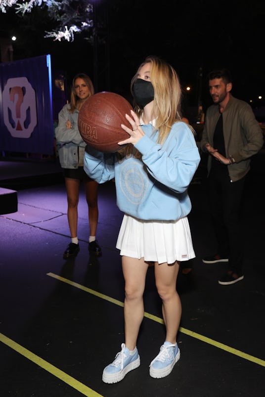 LOS ANGELES, CALIFORNIA - AUGUST 20: Sydney Sweeney plays carnivals games at the GUESS USA X Babylon...