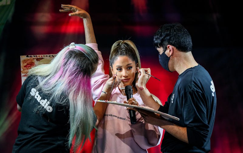 Emma Meehan and Jimmy McCallum staff at Madame Tussauds in Blackpool, Lancashire touch up the Ariana...