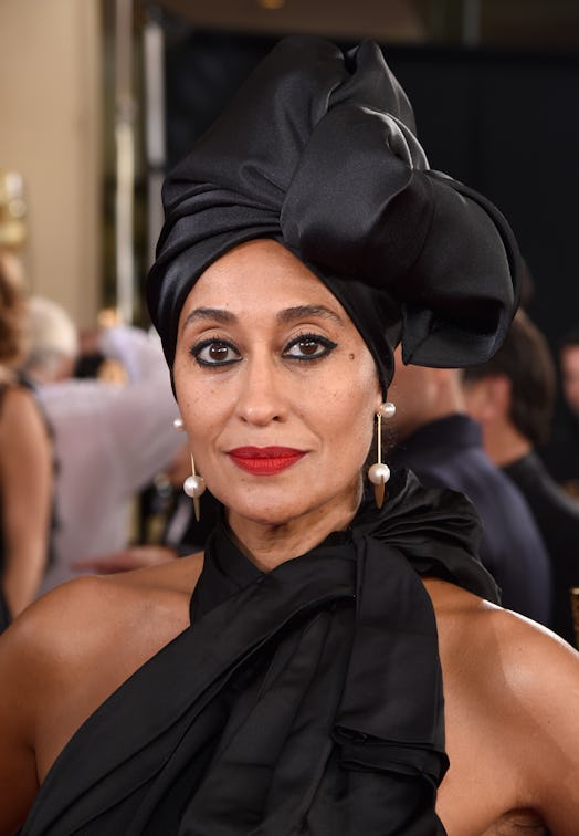 Tracee Ellis Ross wearing a signature blue-based red lipstick.
