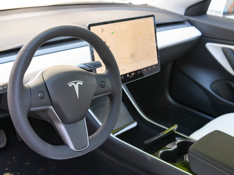 BAARN, NETHERLANDS - AUGUST 25: Tesla Model 3 compact full electric car interior with a large touch ...