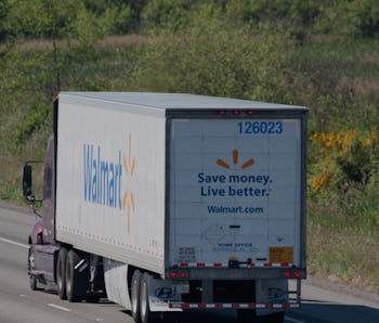 Everett, United States- June 6, 2013: This image shows a Walmart semi truck traveling southbound on...