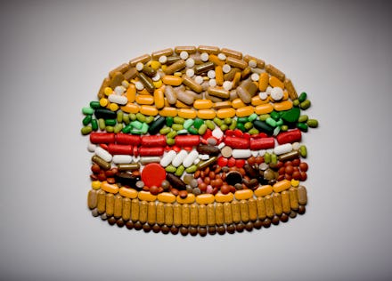 Burger made out of pills viewed from above