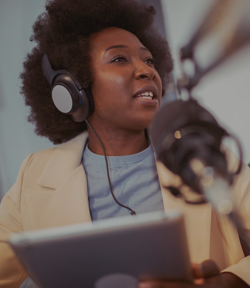 Depicting a gorgeous young woman, the expert in her field, getting interviewed for a podcast streame...