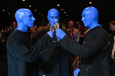 LAS VEGAS, NEVADA - JUNE 24: Blue Man Group celebrate their first performance in Full Color Again at...