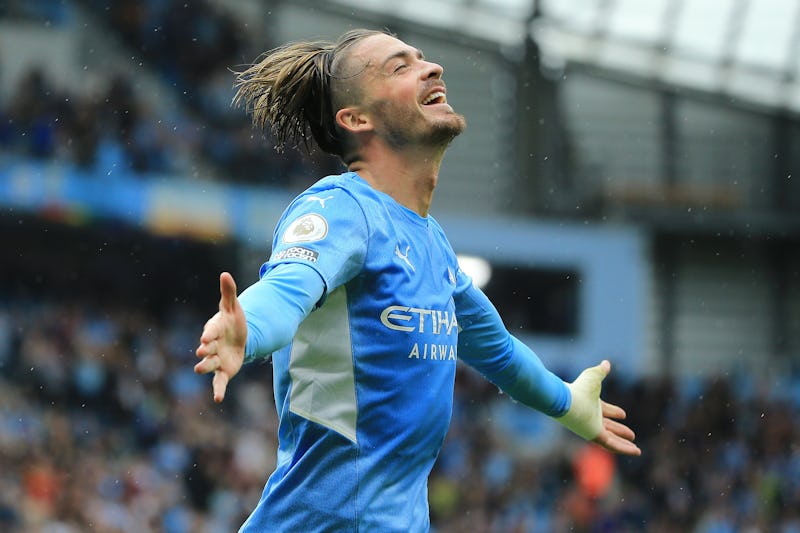 MANCHESTER, ENGLAND - AUGUST 21: Jack Grealish of Manchester City celebrates after scoring their sid...